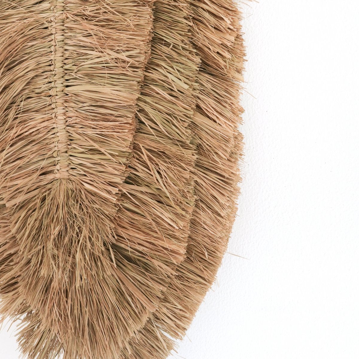 Raffia wall decor 50 cm – leaf-shaped handwoven piece