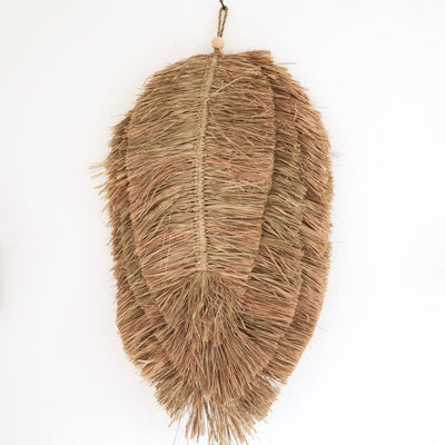 Raffia wall decor 50 cm – leaf-shaped handwoven piece