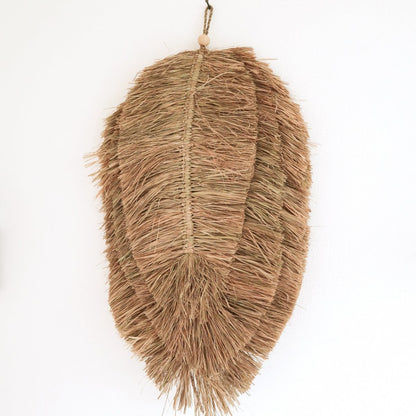 Raffia wall decor 50 cm – leaf-shaped handwoven piece